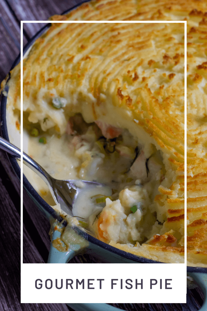 cooked fish pie on wooden board