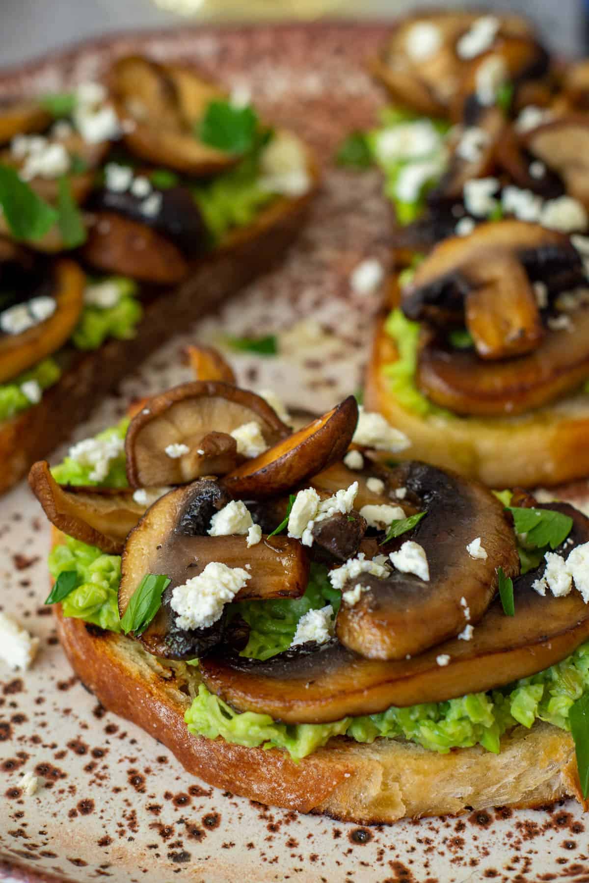 mushroom avocado toast on a plate 